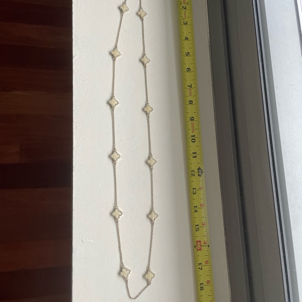 Long gold and cream necklace